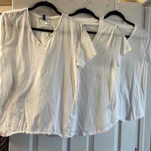 Three medium v-neck white tee’s